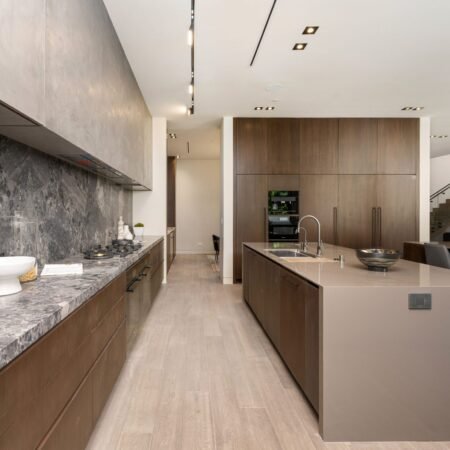 sleek kitchen with marble countertops and wood cab 2026 01 07 23 12 45 utc scaled e1778908863821